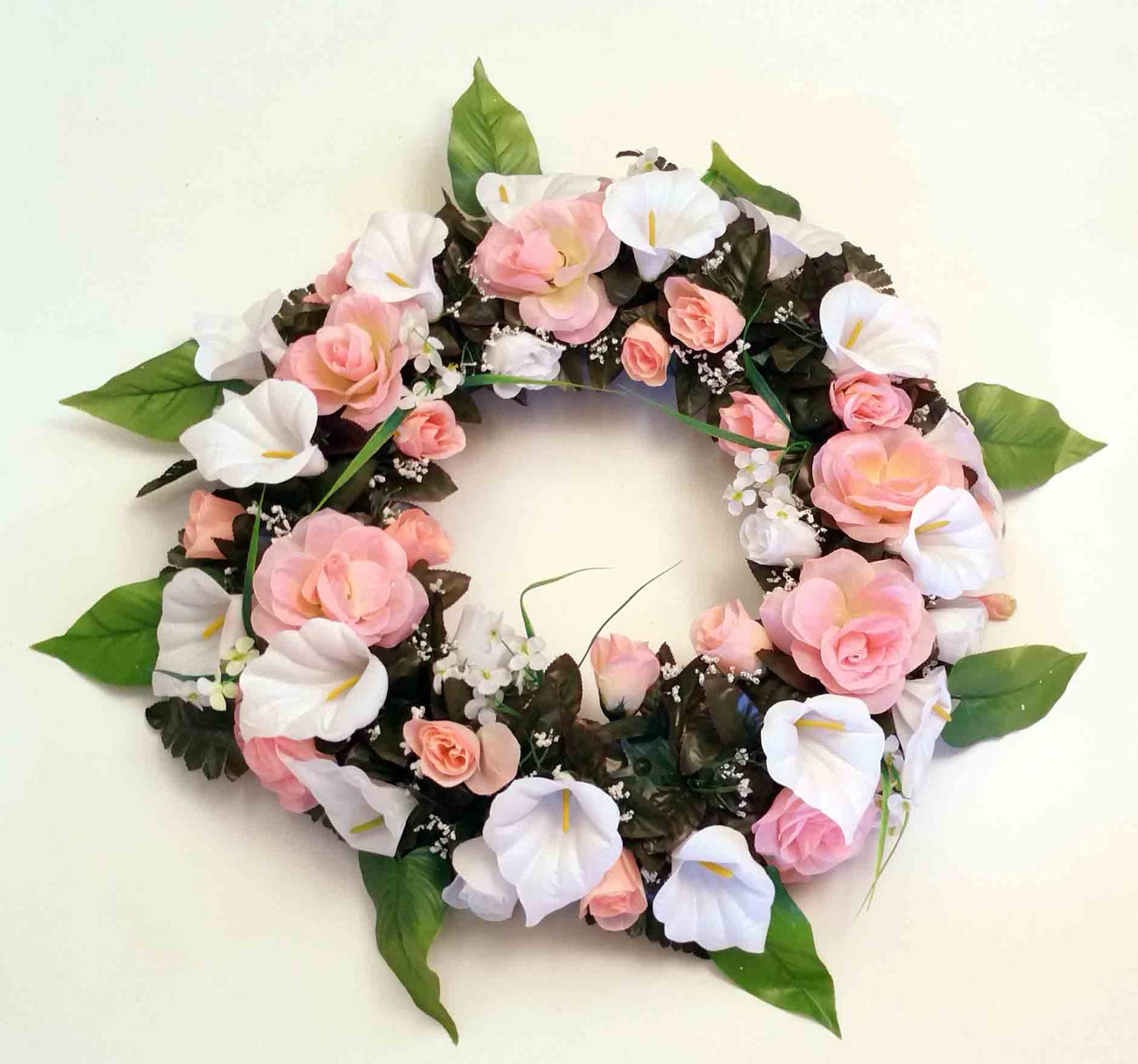 Artificial flower wreath