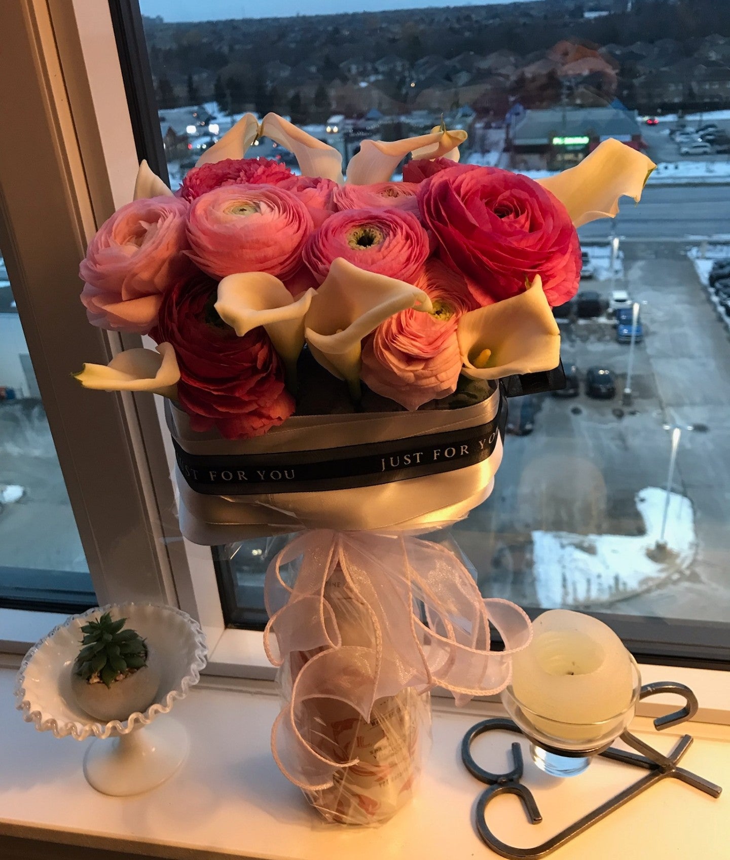 Flower basket on top of non-alcohol bottle
